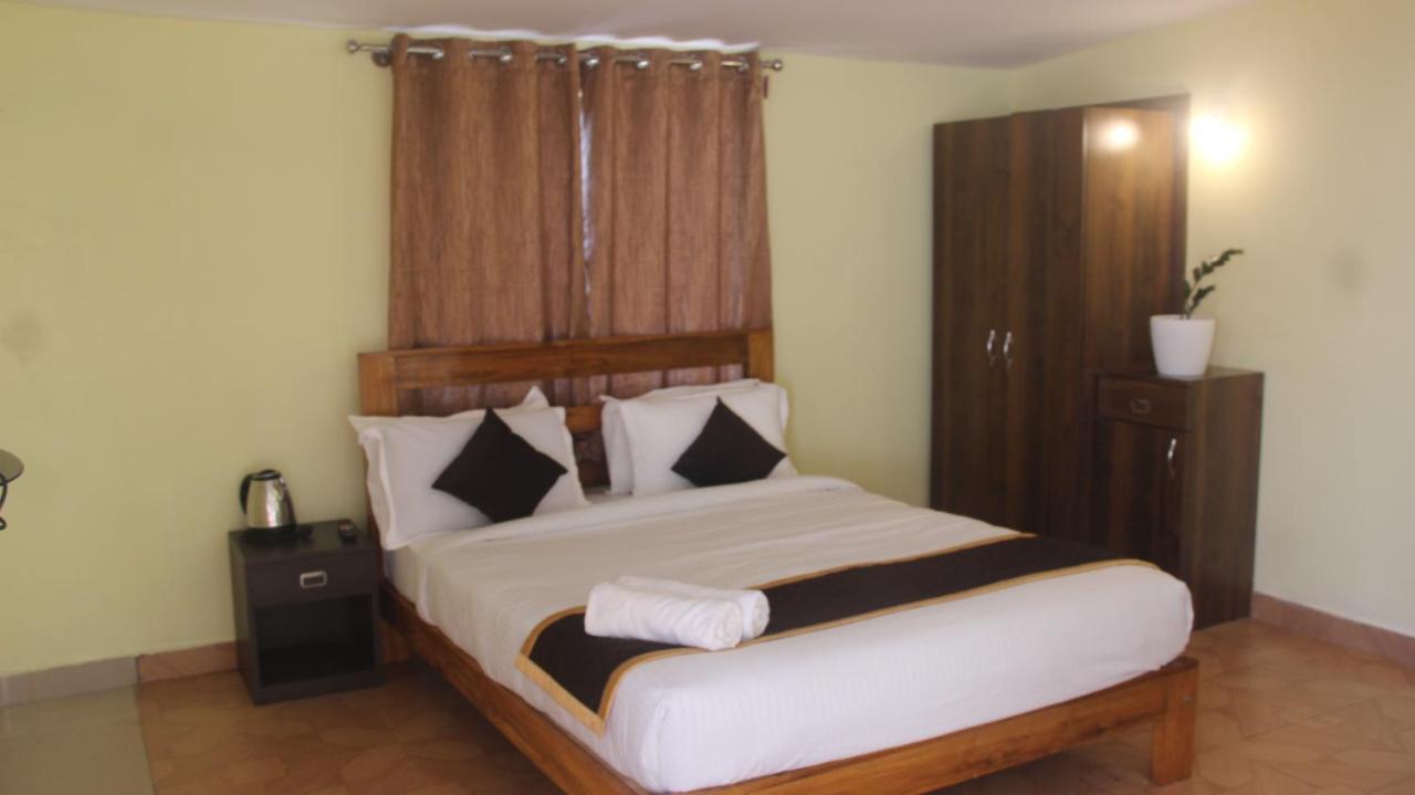 Kollanoor Guest House Madikeri Bagian luar foto