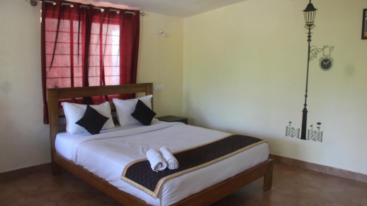Kollanoor Guest House Madikeri Bagian luar foto