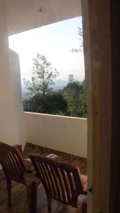 Kollanoor Guest House Madikeri Bagian luar foto