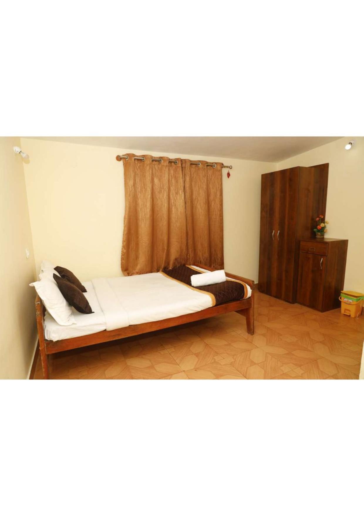 Kollanoor Guest House Madikeri Bagian luar foto