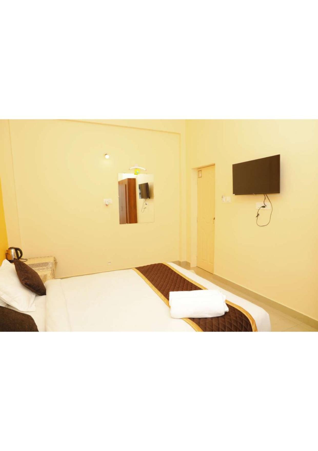 Kollanoor Guest House Madikeri Bagian luar foto